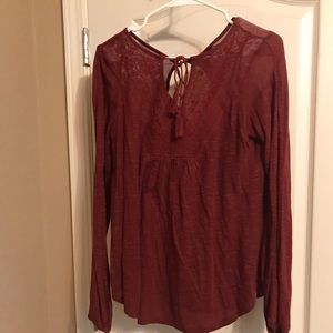 Blouse with open sleeve